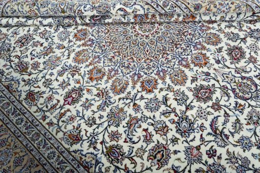 Close-up detail of 2000s Kashan rug from Iran / Persia showing Wool weave