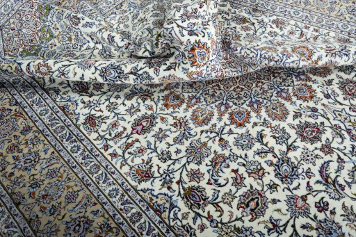 Surface texture of 2000s Kashan rug with natural Wool and intricate pattern