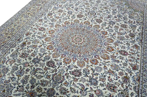 Backside of handmade 2000s Kashan rug showing knot structure and weave density