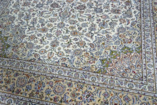 Close-up detail of 2000s Kashan rug from Iran / Persia showing Wool weave