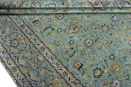 Close-up detail of 2000s Kashan rug from Iran / Persia showing Wool weave