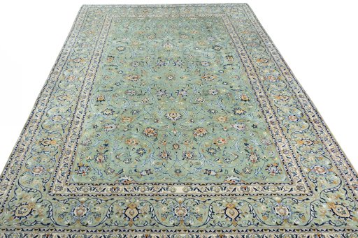 Surface texture of 2000s Kashan rug with natural Wool and intricate pattern