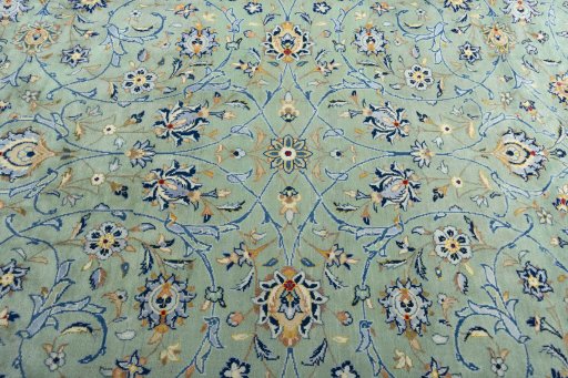 Central medallion detail of 2000s Kashan rug from Iran / Persia