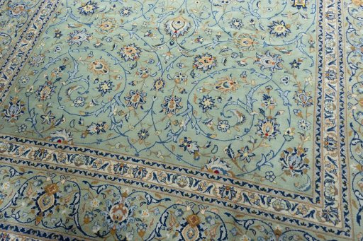 Close-up detail of 2000s Kashan rug from Iran / Persia showing Wool weave