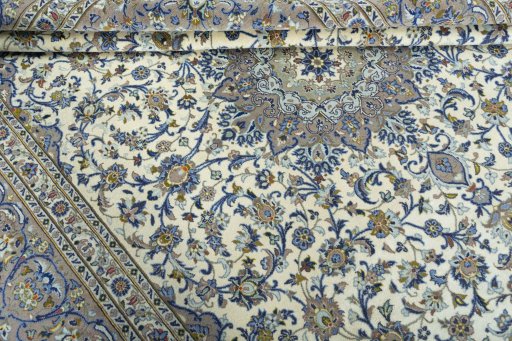 Close-up detail of 2000s Kashan rug from Iran / Persia showing Cork weave