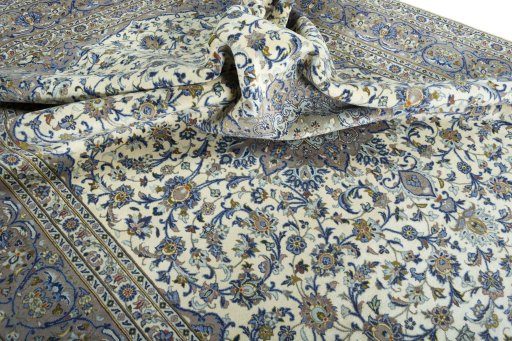 Surface texture of 2000s Kashan rug with natural Cork and intricate pattern