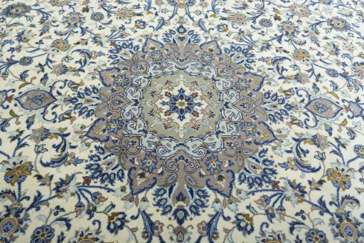 Central medallion detail of 2000s Kashan rug from Iran / Persia