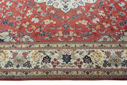 Corner detail of New Kashan rug showing border pattern and Wool pile