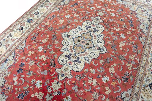 Backside of handmade New Kashan rug showing knot structure and weave density