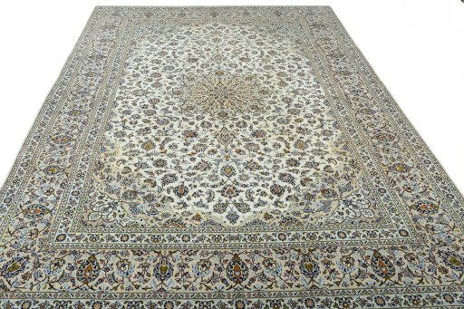 Surface texture of 2000s Kashan rug with natural Wool and intricate pattern