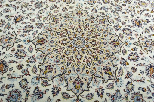 Central medallion detail of 2000s Kashan rug from Iran / Persia