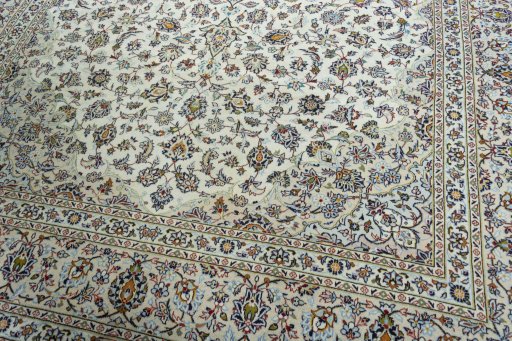 Close-up detail of 2000s Kashan rug from Iran / Persia showing Wool weave