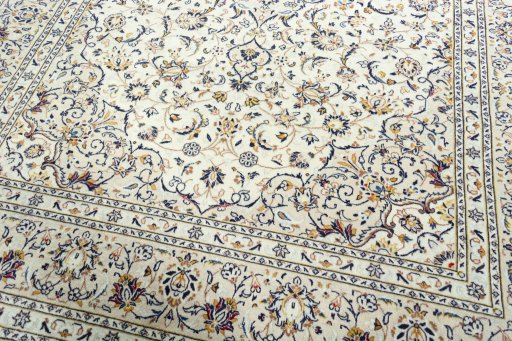 Close-up detail of 2000s Kashan rug from Iran / Persia showing Wool weave
