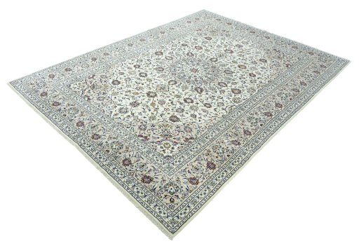 Corner detail of 2000s Kashan rug showing border pattern and Wool pile