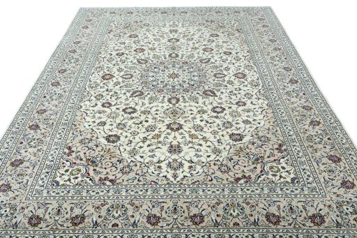 Surface texture of 2000s Kashan rug with natural Wool and intricate pattern