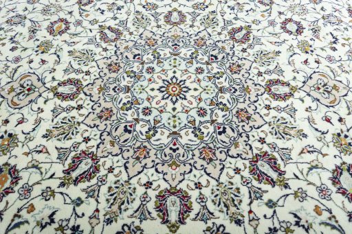Central medallion detail of 2000s Kashan rug from Iran / Persia