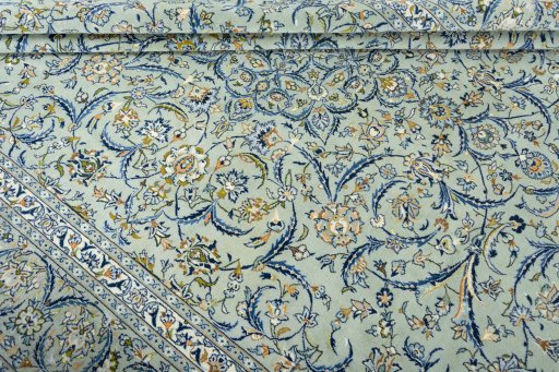 Close-up detail of 2000s Kashan rug from Iran / Persia showing Wool weave