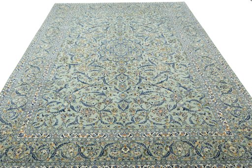 Surface texture of 2000s Kashan rug with natural Wool and intricate pattern