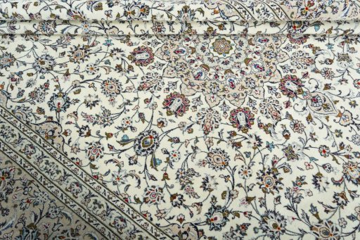 Close-up detail of 2000s Kashan rug from Iran / Persia showing Wool weave