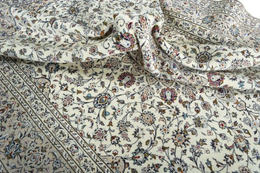 Surface texture of 2000s Kashan rug with natural Wool and intricate pattern