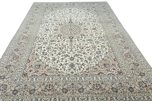 Surface texture of 2000s Kashan rug with natural Wool and intricate pattern