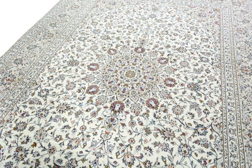 Backside of handmade 2000s Kashan rug showing knot structure and weave density
