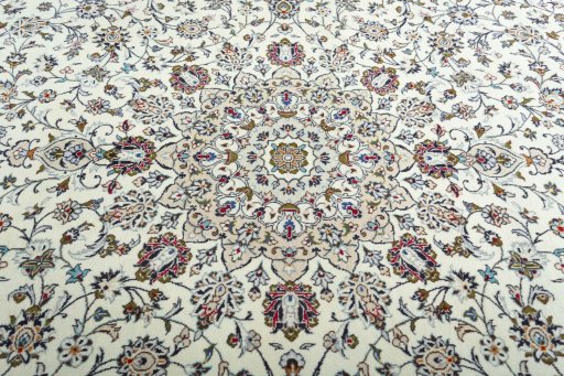 Central medallion detail of 2000s Kashan rug from Iran / Persia