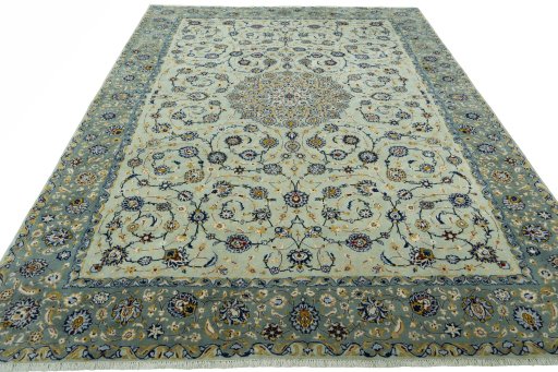 Surface texture of 2000s Kashan rug with natural Wool and intricate pattern