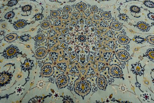 Central medallion detail of 2000s Kashan rug from Iran / Persia
