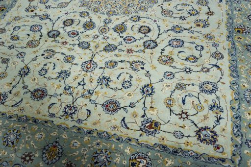Close-up detail of 2000s Kashan rug from Iran / Persia showing Wool weave