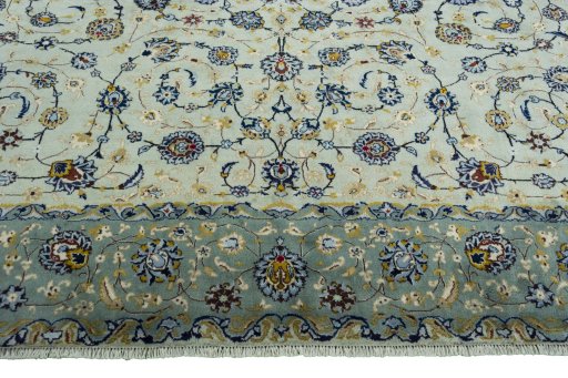 Full view of 2000s Kashan rug from Iran / Persia, 405 × 306 cm in Green tones