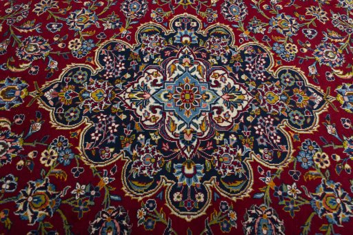 Central medallion detail of 2000s Kashan rug from Iran / Persia