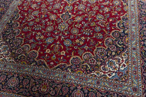 Close-up detail of 2000s Kashan rug from Iran / Persia showing Wool weave