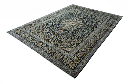 Corner detail of 2000s Kashan rug showing border pattern and Wool pile