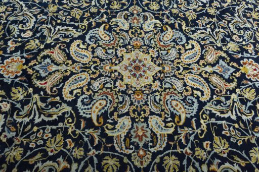 Central medallion detail of 2000s Kashan rug from Iran / Persia