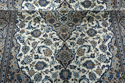 Close-up detail of 2000s Kashan rug from Iran / Persia showing Wool weave