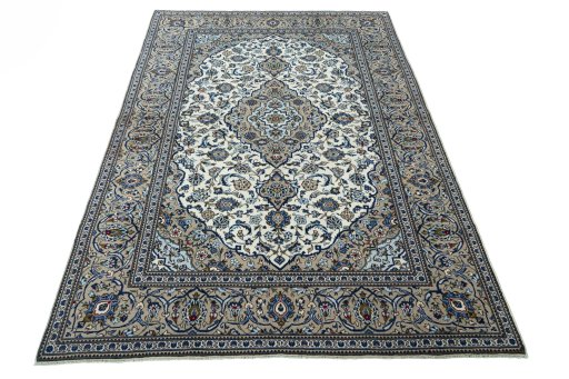 Surface texture of 2000s Kashan rug with natural Wool and intricate pattern