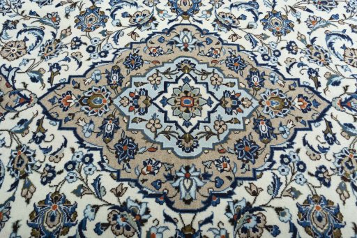 Central medallion detail of 2000s Kashan rug from Iran / Persia