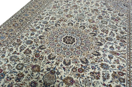 Backside of handmade 2000s Kashan rug showing knot structure and weave density
