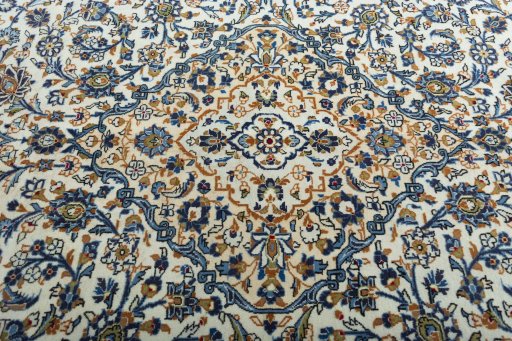 Central medallion detail of 2000s Kashan rug from Iran / Persia
