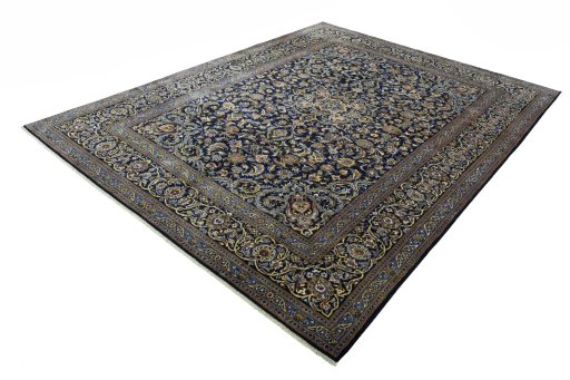 Corner detail of 2000s Kashan rug showing border pattern and Wool pile