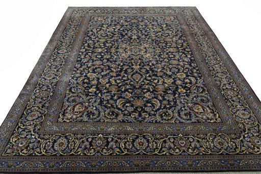Surface texture of 2000s Kashan rug with natural Wool and intricate pattern