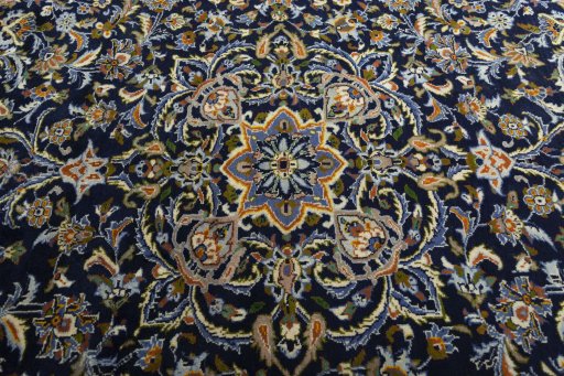 Central medallion detail of 2000s Kashan rug from Iran / Persia