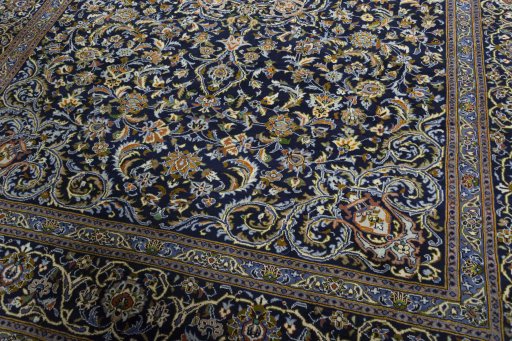 Close-up detail of 2000s Kashan rug from Iran / Persia showing Wool weave