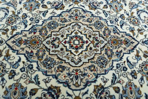 Central medallion detail of 2000s Kashan rug from Iran / Persia