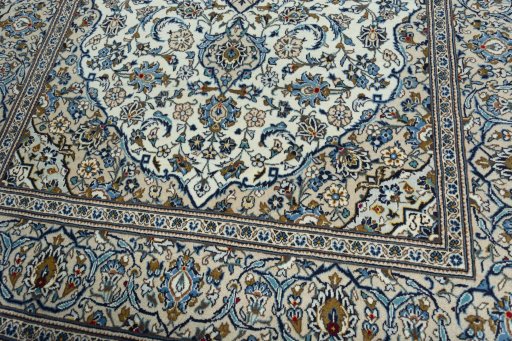 Close-up detail of 2000s Kashan rug from Iran / Persia showing Wool weave
