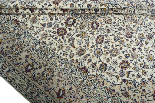 Close-up detail of 2000s Kashan rug from Iran / Persia showing Wool weave