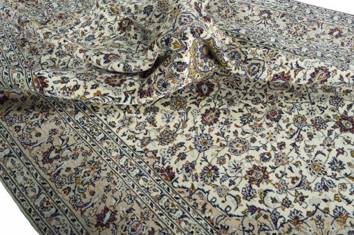 Surface texture of 2000s Kashan rug with natural Wool and intricate pattern