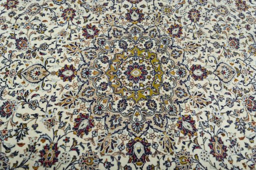 Central medallion detail of 2000s Kashan rug from Iran / Persia