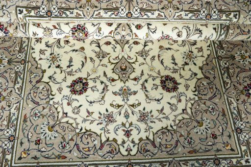 Close-up detail of 2000s Kashan rug from Iran / Persia showing Wool weave